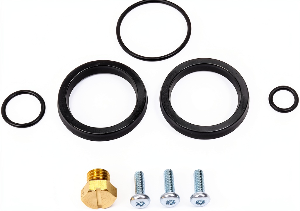 Dorman fuel filter seal kit components laid out on a workbench